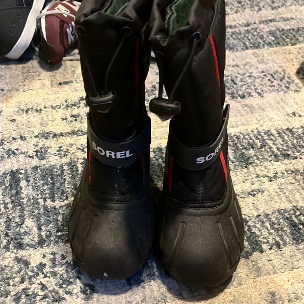 Sorel Black and Red Snow Boots